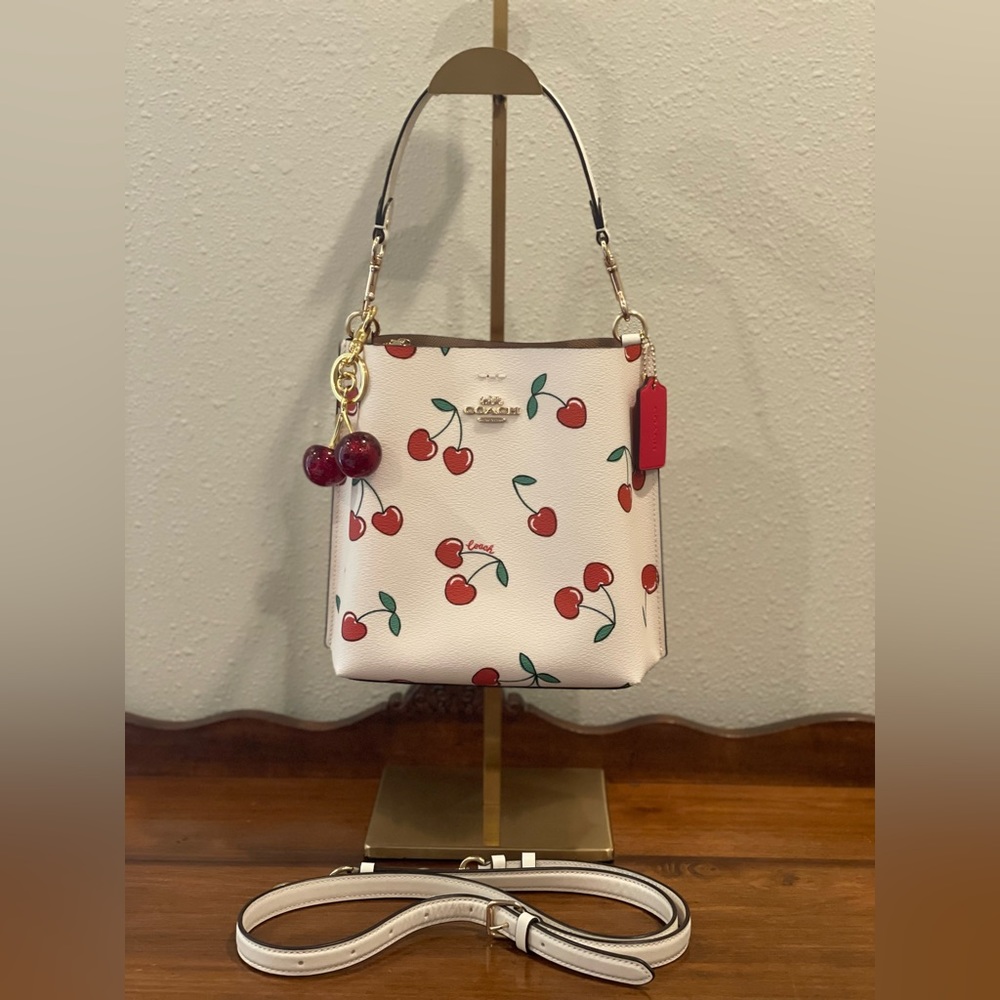 Coach White Cherry Print Crossbody Bag with Red Accents - Picture 2 of 16